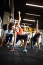 Fitness, sport, training and lifestyle concept. Group of people exercising in gym Royalty Free Stock Photo