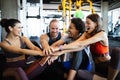 Fitness, sport, training and lifestyle concept. Group of people exercising in gym Royalty Free Stock Photo