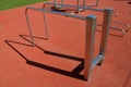 Fitness sports fields with stainless steel tools resemble torture tools with chains and handles. soft rubber surface sports ground