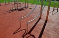 Fitness sports fields with stainless steel tools resemble torture tools with chains and handles. soft rubber surface sports ground