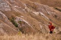Fitness sports runner man jogging on field among mountains, beautiful landscape Royalty Free Stock Photo