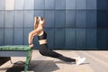 Fitness sporty woman during outdoor exercises workout