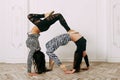 Fitness, stretching practice, group of two attractive women doing yoga. Wellness concept Royalty Free Stock Photo