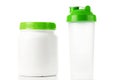 Green protein shaker and jar on white