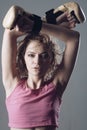 Fitness trainer or sportive lady rest after boxing, hard training.