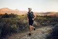 Fitness, training and exercise man running outdoor for a workout. Ambitious latino athlete run and exercising for a Royalty Free Stock Photo