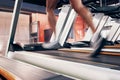 Fitness, treadmill with man running on machine for exercise, cardio training and workout for cardiovascular and heart Royalty Free Stock Photo