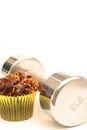 Fitness weight & chocolate cupcake vertical Royalty Free Stock Photo