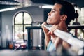 Fitness, weightlifting and Asian man doing workout in the gym for strength, power and muscular body. Health, wellness Royalty Free Stock Photo