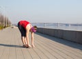 Fitness woman doing exercises during outdoor cross training workout