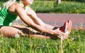 Fitness woman doing exercises during outdoor cross training workout in sunny morning Royalty Free Stock Photo