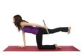 Fitness woman doing kneeling triceps kickback