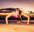 Fitness woman doing push ups Royalty Free Stock Photo