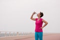 Fitness woman drinking water Royalty Free Stock Photo