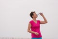 Fitness woman drinking water Royalty Free Stock Photo