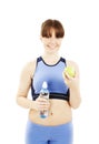 Fitness woman eating apple smiling happy Royalty Free Stock Photo