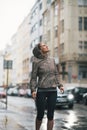 Fitness woman exposed to rain while jogging Royalty Free Stock Photo