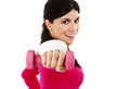 Happy fitness woman lifting dumbbells Royalty Free Stock Photo