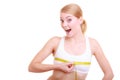 Fitness woman fit girl with measure tape measuring her bust Royalty Free Stock Photo