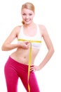 Fitness woman fit girl with measure tape measuring her bust Royalty Free Stock Photo