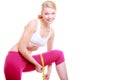 Fitness woman fit girl with measure tape measuring her thigh Royalty Free Stock Photo