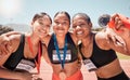 Fitness, woman and friends with smile for medal, winning or victory in running sport at the stadium together. Group of Royalty Free Stock Photo