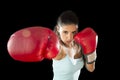 Fitness woman with girl red boxing gloves posing in defiant and competitive fight attitude Royalty Free Stock Photo