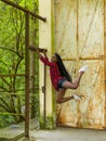 Fitness woman hanging exercise