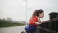 Fitness woman is headphones is doing push-ups during outdoor cross training workout Royalty Free Stock Photo