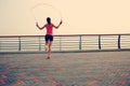 fitness woman jumping rope on seaside Royalty Free Stock Photo