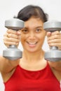 Fitness woman lifting weights