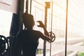 Fitness woman in loft gym drinking water After a good workout