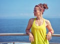 Fitness woman looking into distance and listening to music Royalty Free Stock Photo