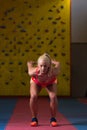 Fitness Woman Performing a Long Jump In Gym Royalty Free Stock Photo