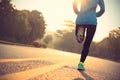 Fitness woman runner athlete running at road Royalty Free Stock Photo