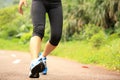 Fitness woman runner running on trail Royalty Free Stock Photo