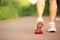 Fitness woman runner running on trail Royalty Free Stock Photo