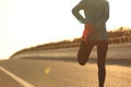 fitness woman runner stretching legs before run Royalty Free Stock Photo