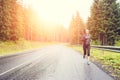 Fitness woman running at the morning in mountains. Royalty Free Stock Photo