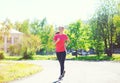 Fitness woman running in park, female runner workout, sport and healthy lifestyle Royalty Free Stock Photo