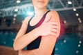 Fitness, woman and shoulder pain after training, workout and inflammation with torn muscle, sports accident or painful