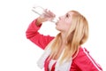 Fitness woman sport girl with towel drinking water from bottle isolated Royalty Free Stock Photo