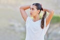 Fitness, woman and start of run in a park, hair tie and wellness training, cardio and morning exercise in nature. Girl Royalty Free Stock Photo