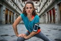 Fitness woman stretching near uffizi gallery in florence, italy Royalty Free Stock Photo