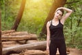 Fitness Woman Stretching In Wooded Forest Area Royalty Free Stock Photo