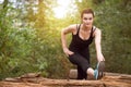 Fitness Woman Stretching In Wooded Forest Area Royalty Free Stock Photo