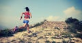 Runner running at great wall on the top of mountain Royalty Free Stock Photo