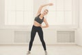 Fitness woman warmup stretching training indoors