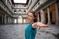 Fitness woman workout near uffizi gallery in florence, italy Royalty Free Stock Photo