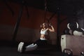 Fitness woman workout on the TRX in the gym Royalty Free Stock Photo